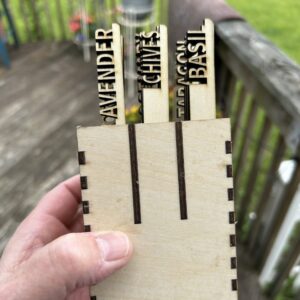 Hand-Crafted wooden garden stakes for herbs and plants. Rustic, made to order, and perfect for any charming herb garden.